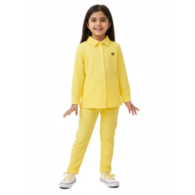 A girl wearing The Sunny Side yellow two-piece outfit - girls co-ord sets Pakistan.