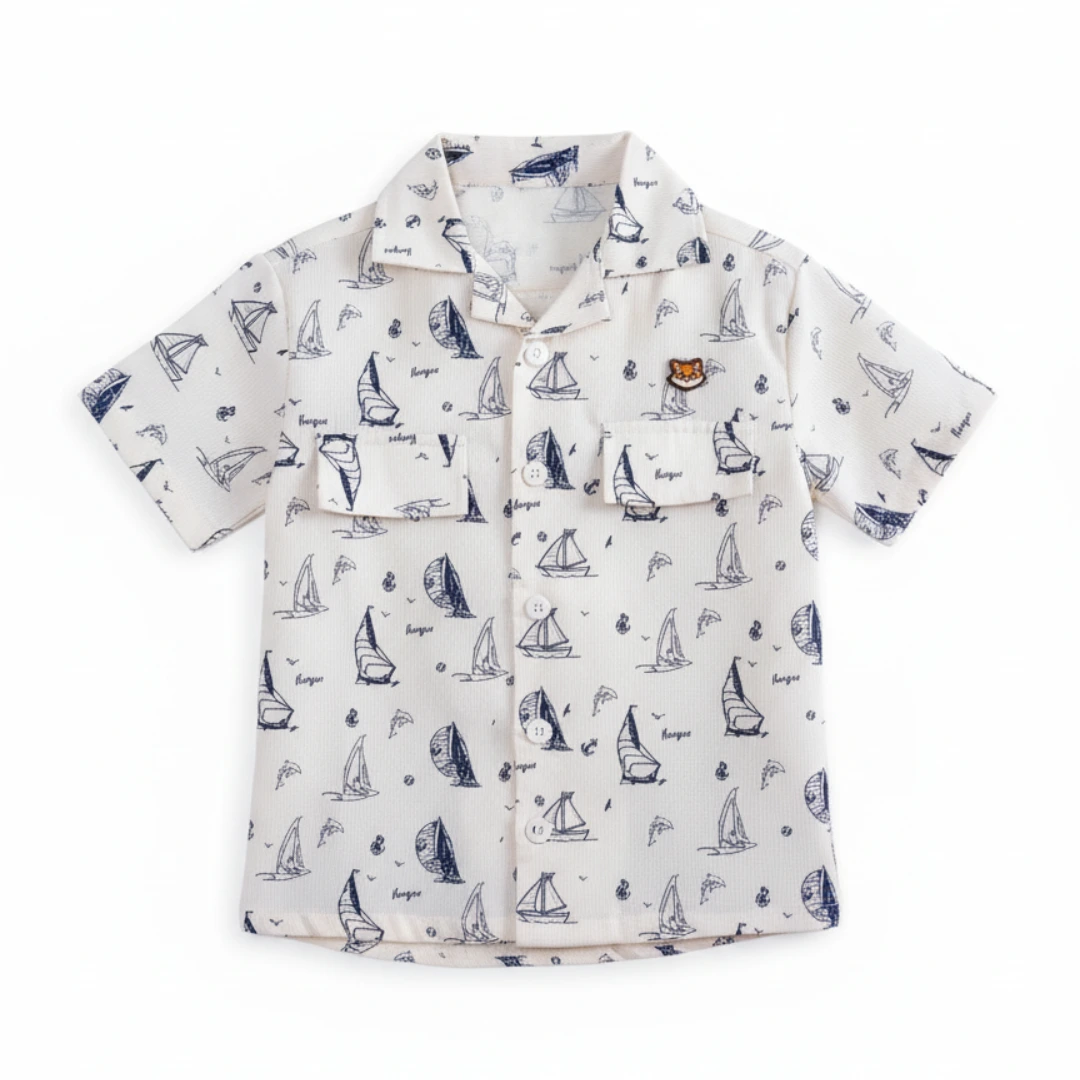 Close-up of the ship and anchor print on The Explorer Shirt by Orange - stylish printed shirts for kids.